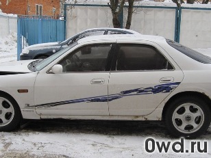 Битый автомобиль Nissan Skyline